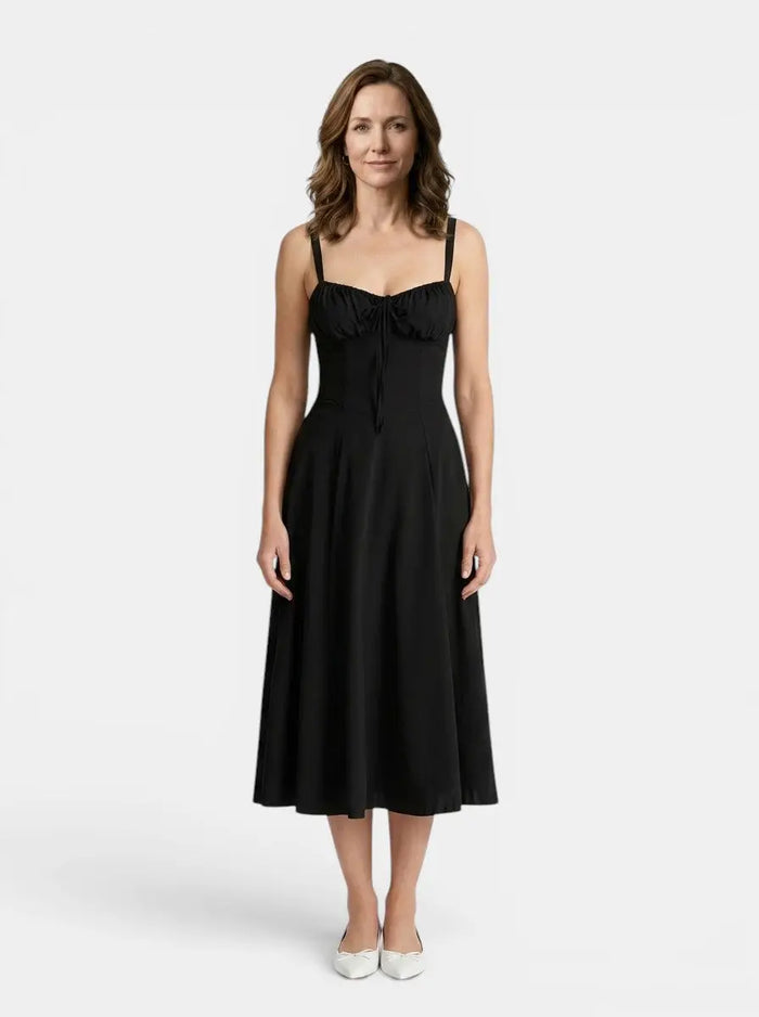 Women's floral midi dress with elegant corset design and flowing skirt, perfect for summer occasions, by LondonLaneStore.