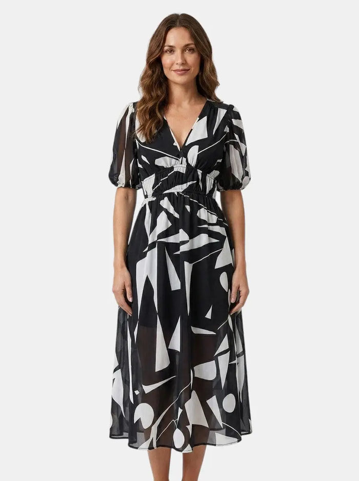 Lightweight women's floral midi dress by LondonLaneStore, featuring romantic summer style with a flowy, floral pattern.