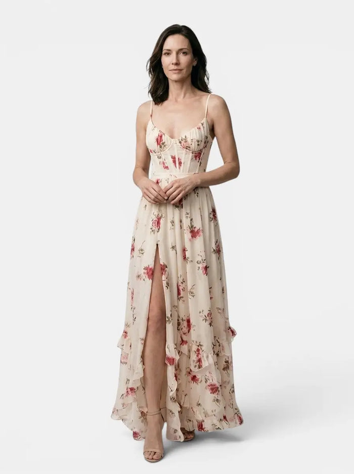Women's floral print maxi dress by LondonLaneStore, elegant flowing summer gown with side slit and vibrant floral pattern.