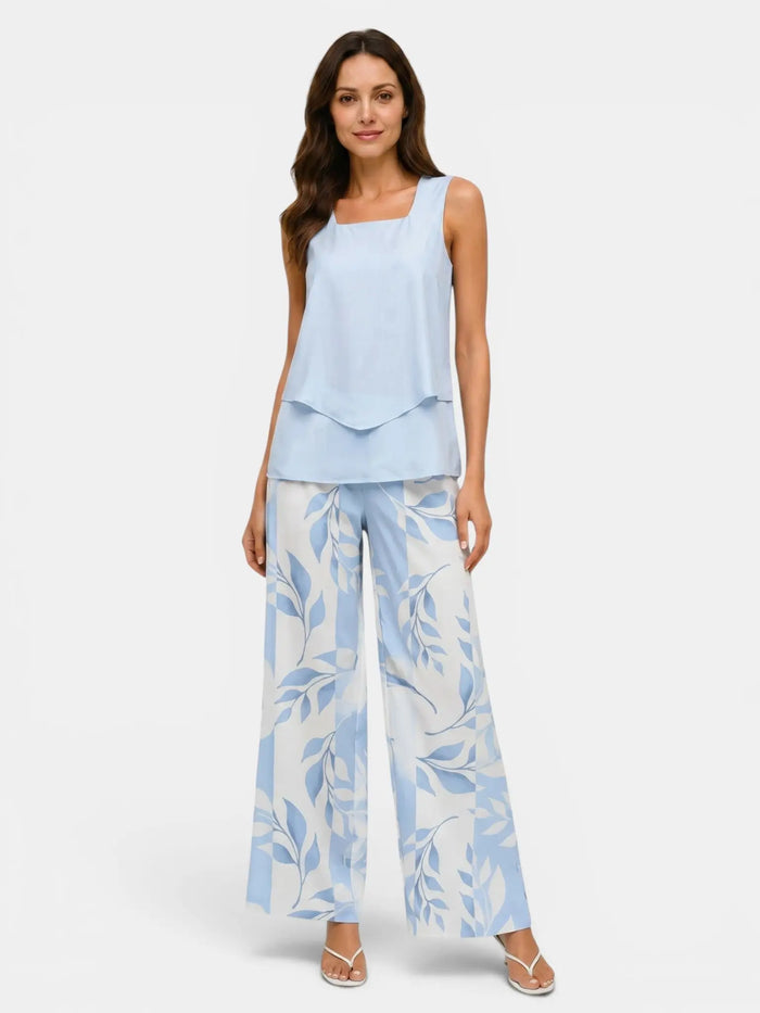 Women's floral print layered sleeveless top and relaxed wide-leg trousers set by LondonLaneStore, perfect for casual wear.
