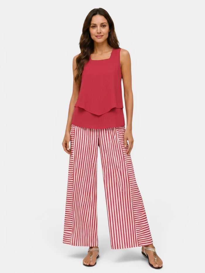 Women's floral print outfit by LondonLaneStore featuring a layered sleeveless top and relaxed wide-leg trousers.