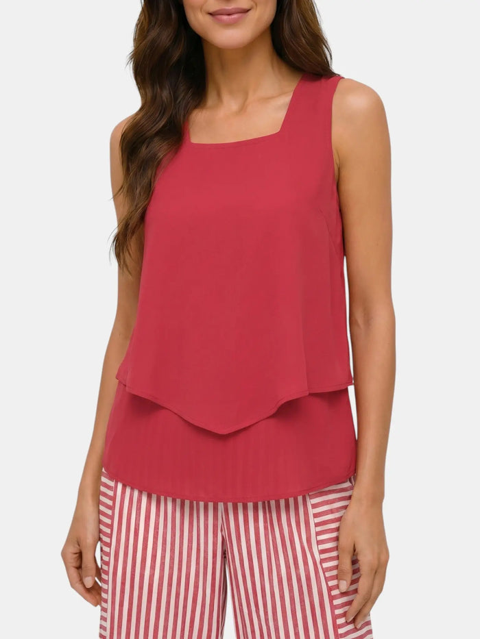 Women's floral print suit featuring a layered sleeveless top and relaxed wide-leg trousers by LondonLaneStore.