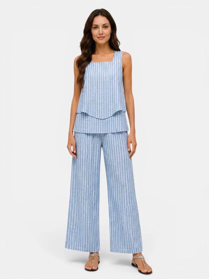 Women's floral print outfit by LondonLaneStore featuring a layered sleeveless top and relaxed wide-leg trousers in a stylish design.