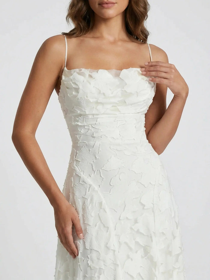 Elegant women's floral textured strapless A-line wedding dress, maxi gown with intricate floral details and a flowing silhouette.