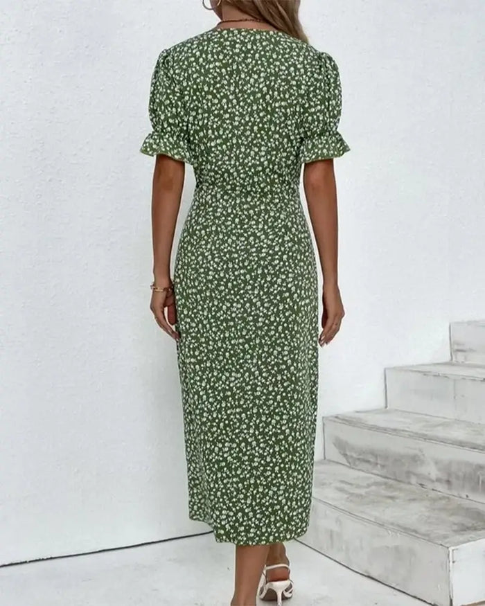 Women's floral wrap midi dress with adjustable V-neck, perfect for summer, featuring a stylish and elegant design.