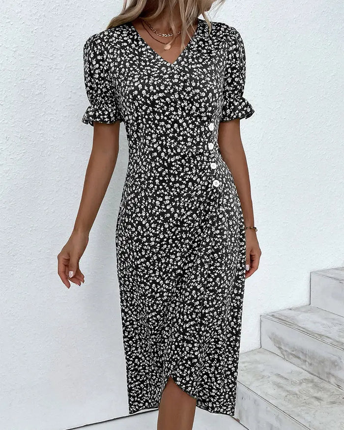 Women’s floral wrap midi dress with adjustable V-neck, elegant summer style, featuring a flowy silhouette and vibrant floral pattern.