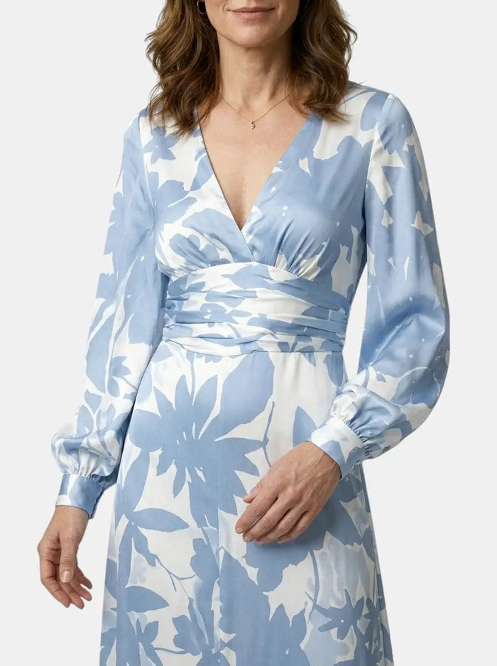 Women’s flowing fabric maxi dress with defined waist and long sleeves, perfect for summer, by LondonLaneStore.