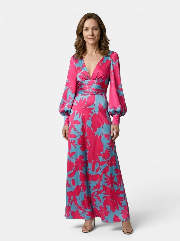 Women's flowing fabric maxi dress with defined waist and long sleeves, perfect for summer, by LondonLaneStore.