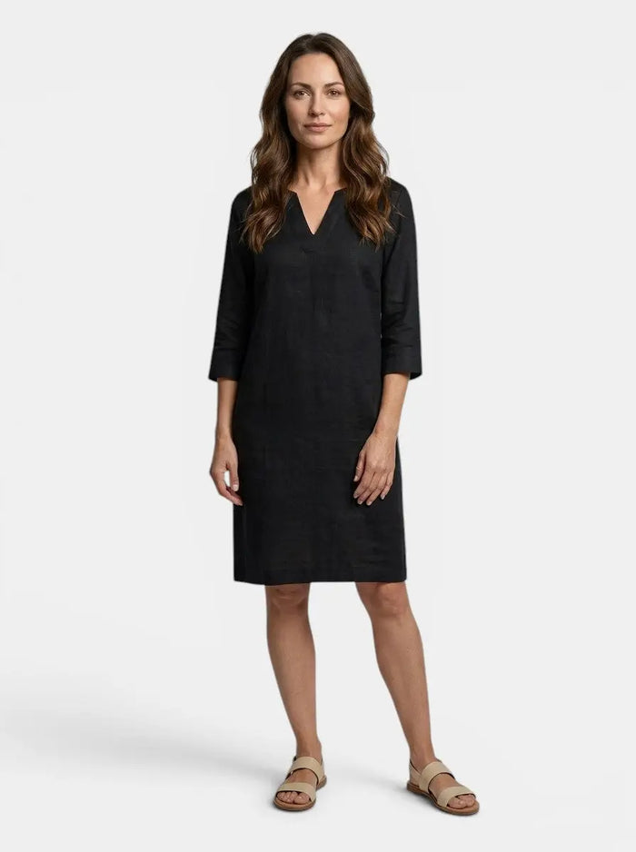 Women's flowing summer dress with elegant V-neck and layered design, stylish and comfortable for warm weather.