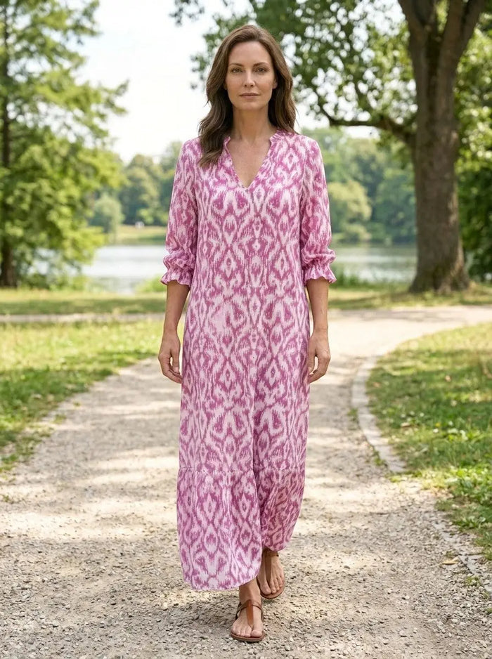 Women's flowing viscose maxi dress in a relaxed summer style, featuring lightweight fabric and elegant design.