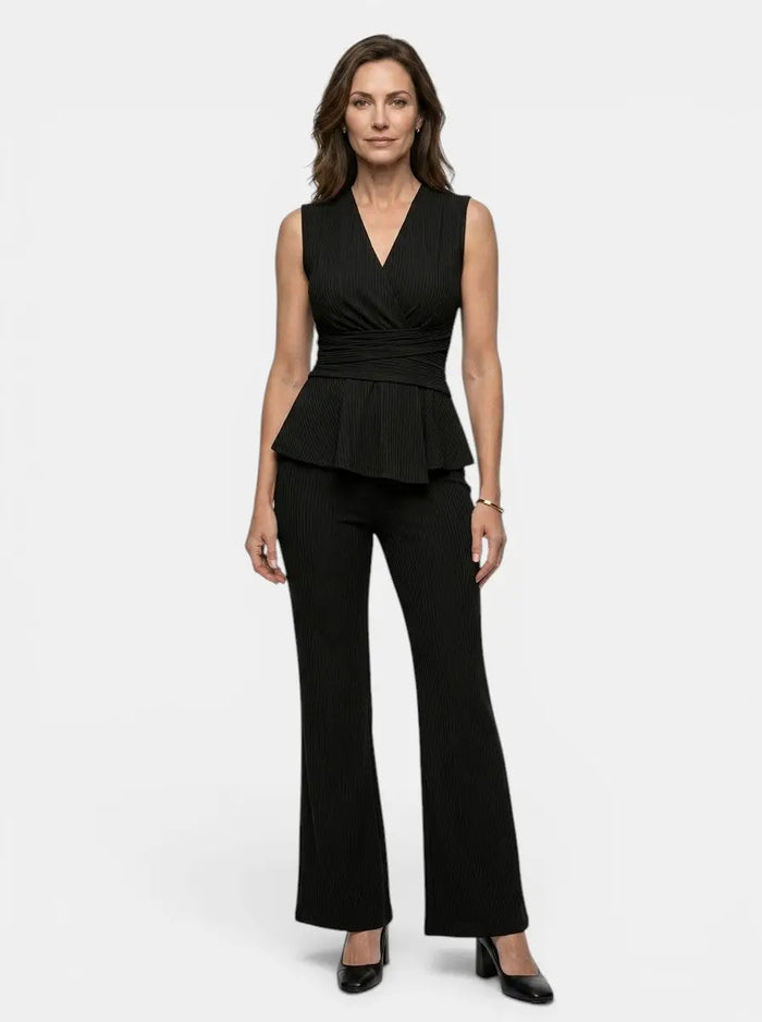 Women's fluid drape wrap top and flared trousers set by LondonLaneStore, featuring an elegant tailored peplum design.