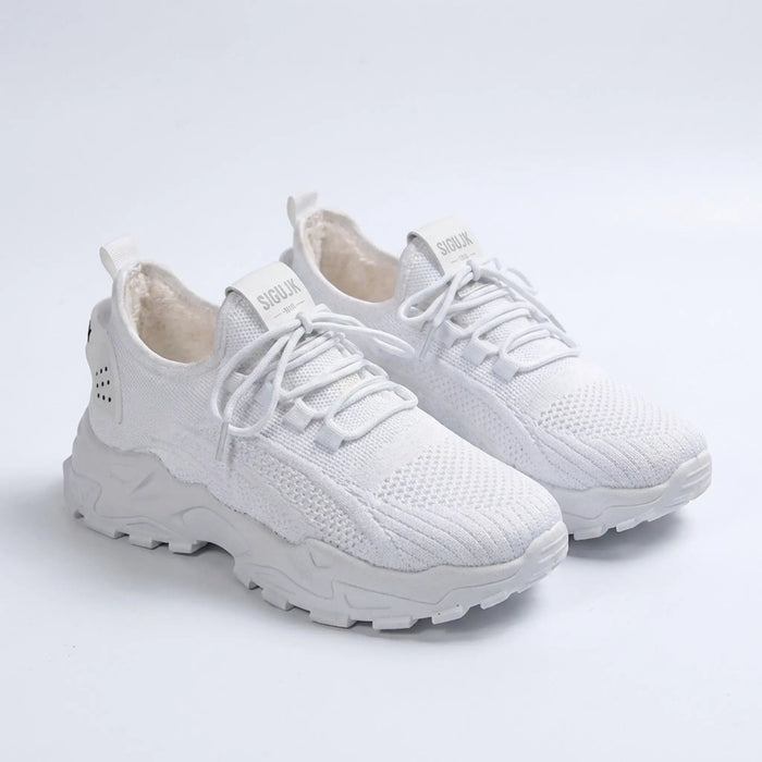 Women’s knit fabric sneakers from LondonLaneStore featuring a stylish low top design and chunky sole for comfortable walking.