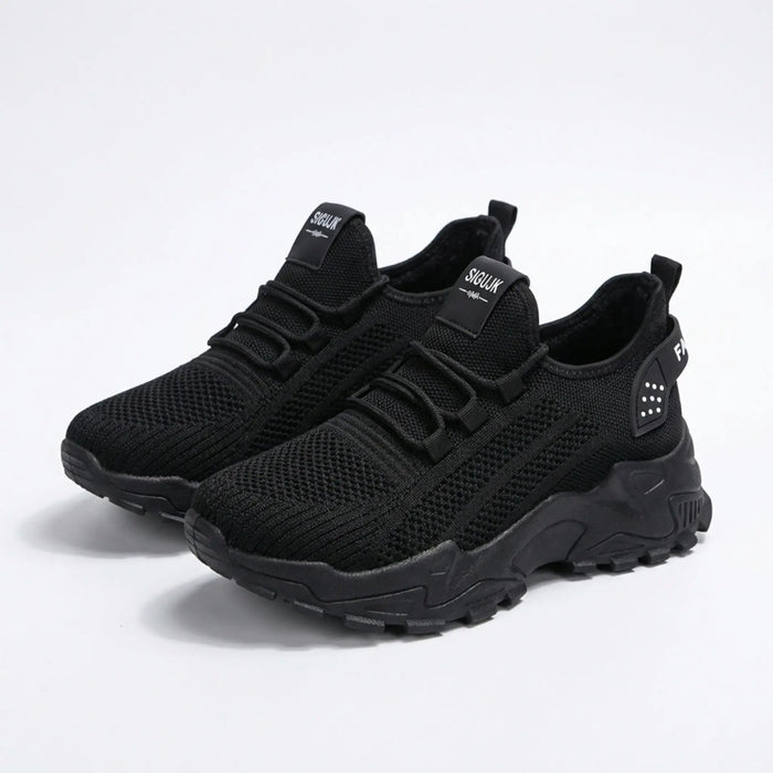 Women's knit fabric sneakers with a stylish low-top design and chunky sole, perfect for casual walking and everyday wear.