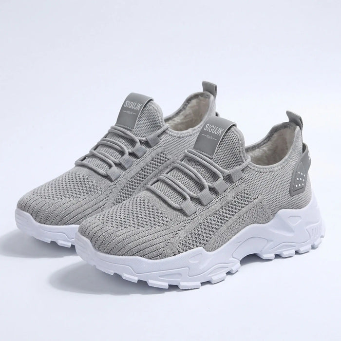 Women’s knit fabric sneakers with a stylish low top design and chunky sole for comfortable walking.