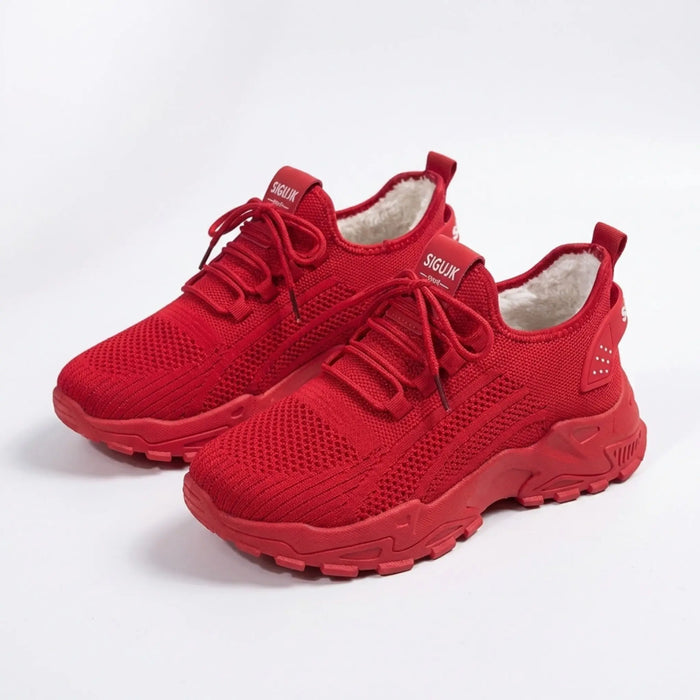 Women’s knit fabric sneakers with a low top design and chunky sole, perfect for stylish walking shoes.