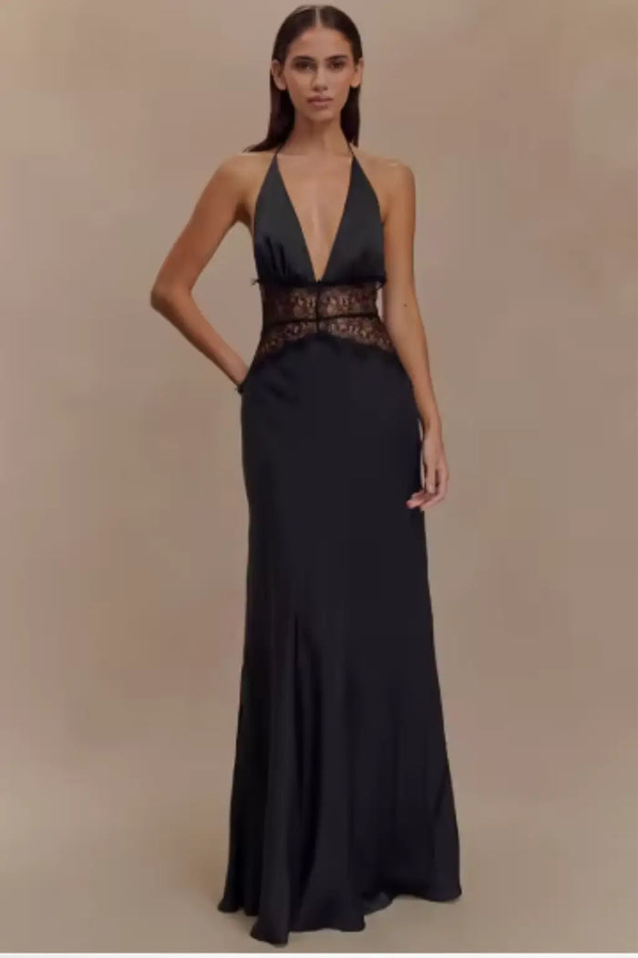 Elegant women's lace maxi dress featuring a modern halter neck and backless design, perfect for formal occasions.