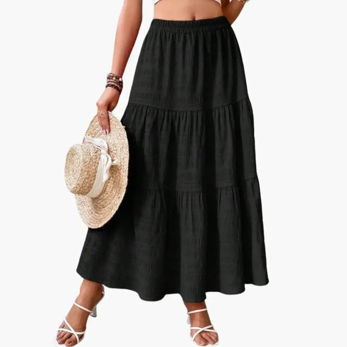 Women's layered woven maxi skirt with tiered design, ankle-length, elegant style from LondonLaneStore.