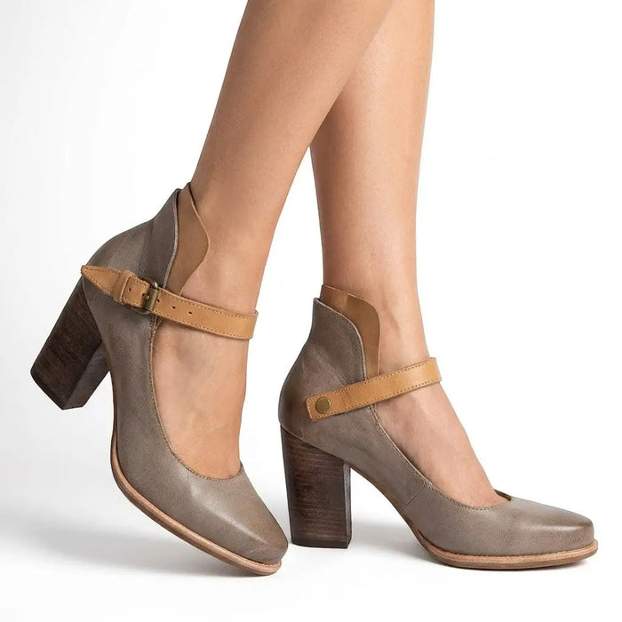 Women's leather heel sandals with elegant adjustable straps and orthopedic support, perfect for summer footwear.