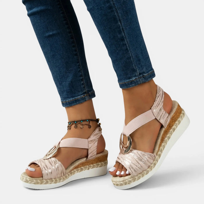 Women's leather platform sandals with open toe and adjustable ankle strap, featuring a stylish and comfortable design.