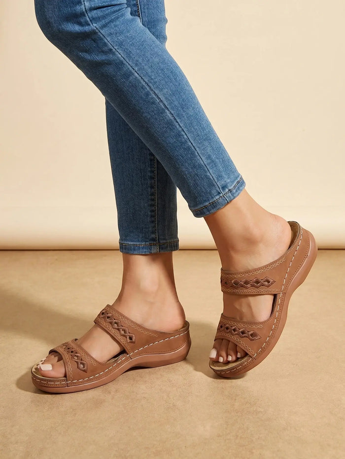 Women's leather sandals with supportive two-strap design, perfect for summer casual wear, from LondonLaneStore.
