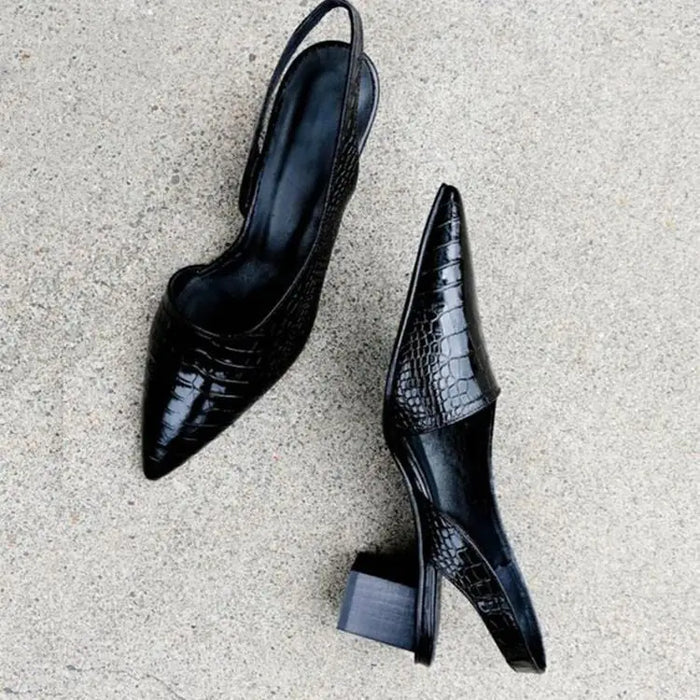 Women's leather slingback heels with pointed toes and block heel support, stylish and comfortable for all-day wear.