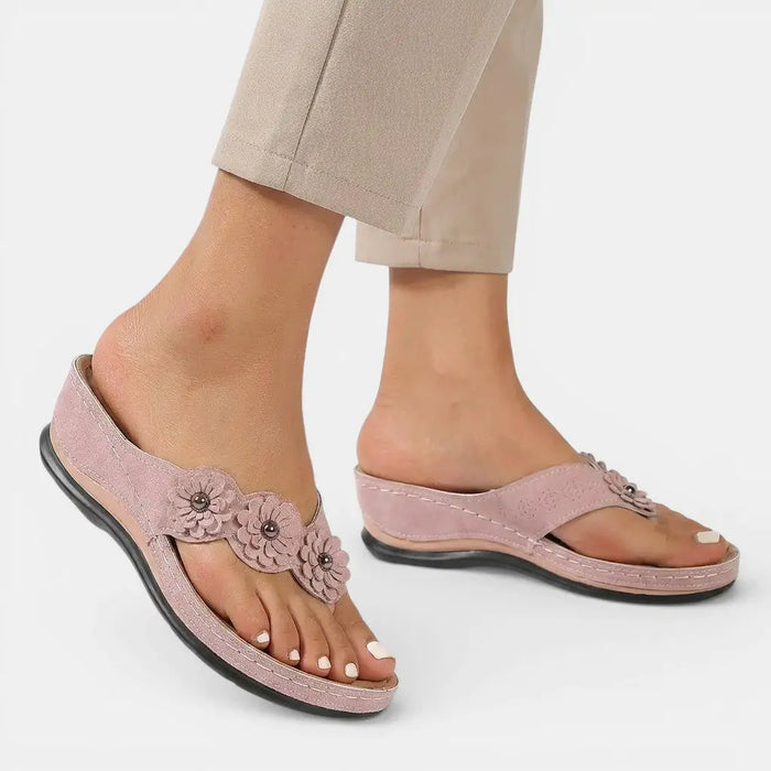 Women’s leather slip-on orthopedic sandals with elegant design and comfortable footbed, ideal for stylish orthopedic footwear.