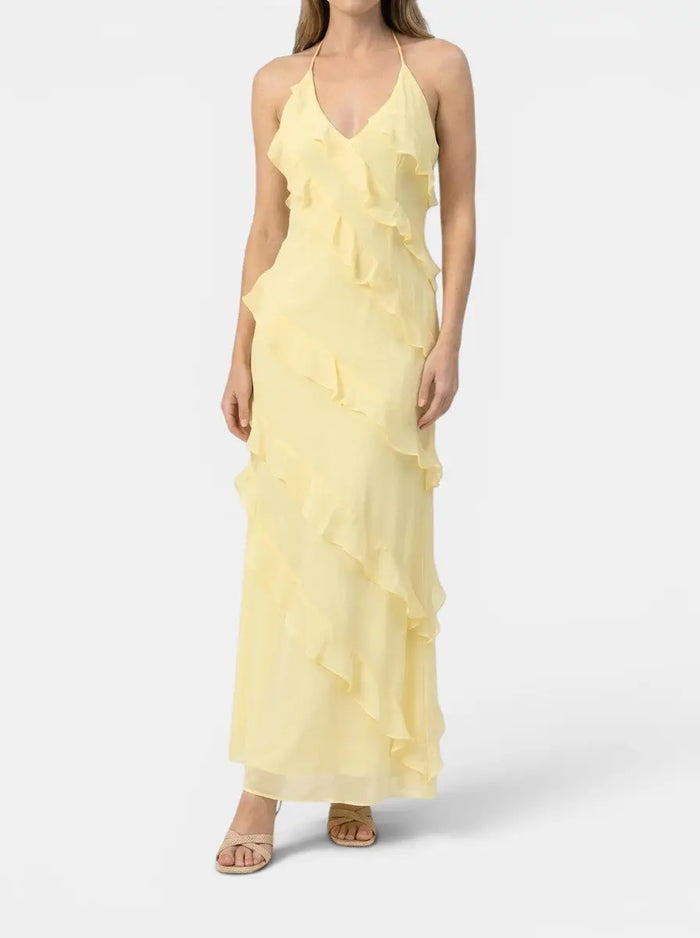 Elegant women's light fabric maxi dress with halter neck and tiered ruffles, perfect for summer events.