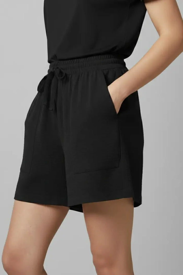 Lightweight women's casual drawstring shorts in relaxed fit, perfect for summer, by LondonLaneStore.