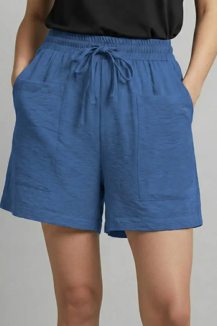 Lightweight women's casual drawstring shorts with relaxed fit, perfect for summer, in a breezy, comfortable style.