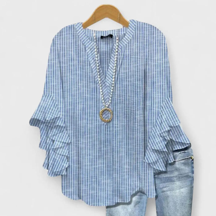 Women’s lightweight cotton blouse with long sleeves, airy summer top in a casual style, suitable for warm weather.