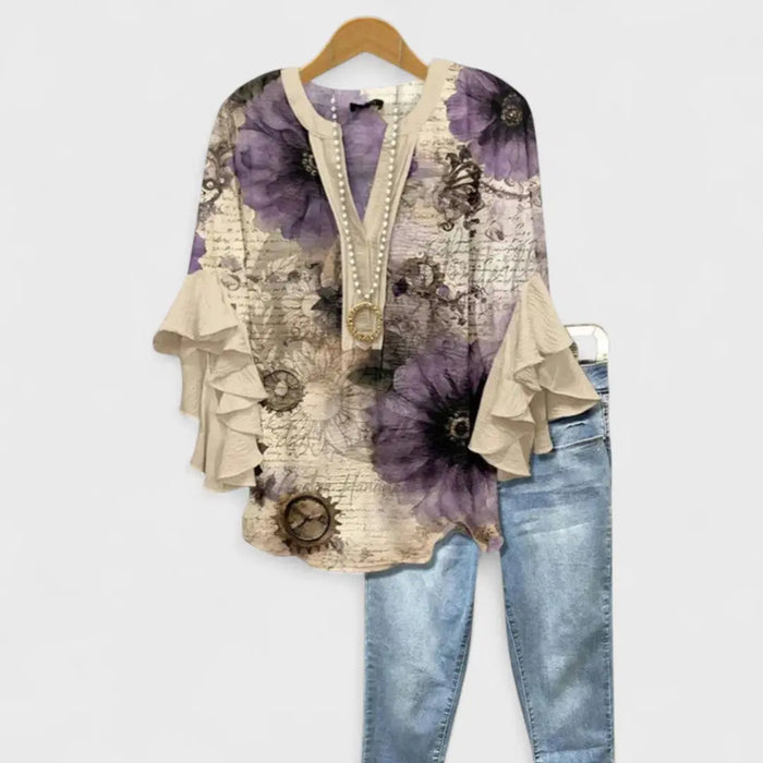 Lightweight white cotton women's blouse with long sleeves, airy summer top, stylish and comfortable for warm weather.
