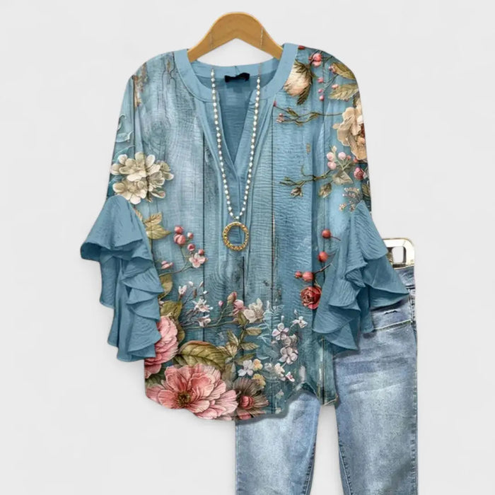 Lightweight women's cotton blouse with long sleeves, airy summer top, in a casual style, perfect for warm weather.