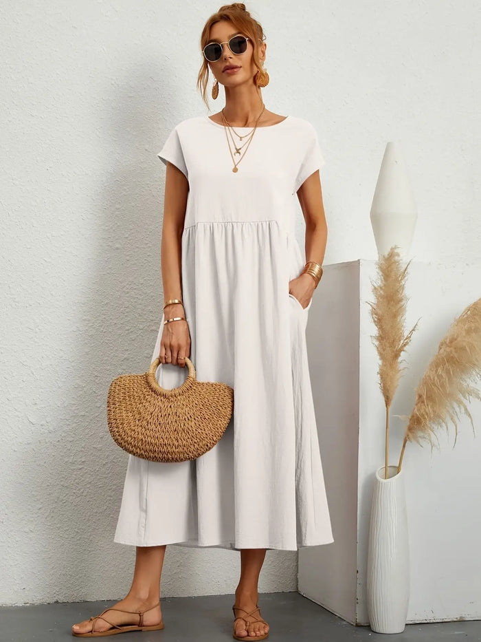 Women's lightweight cotton summer dress by LondonLaneStore featuring an elegant relaxed fit and refined neckline, perfect for warm weather.