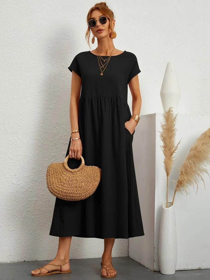 Women’s lightweight cotton summer dress from LondonLaneStore with a relaxed fit and refined neckline, perfect for casual warm-weather wear.