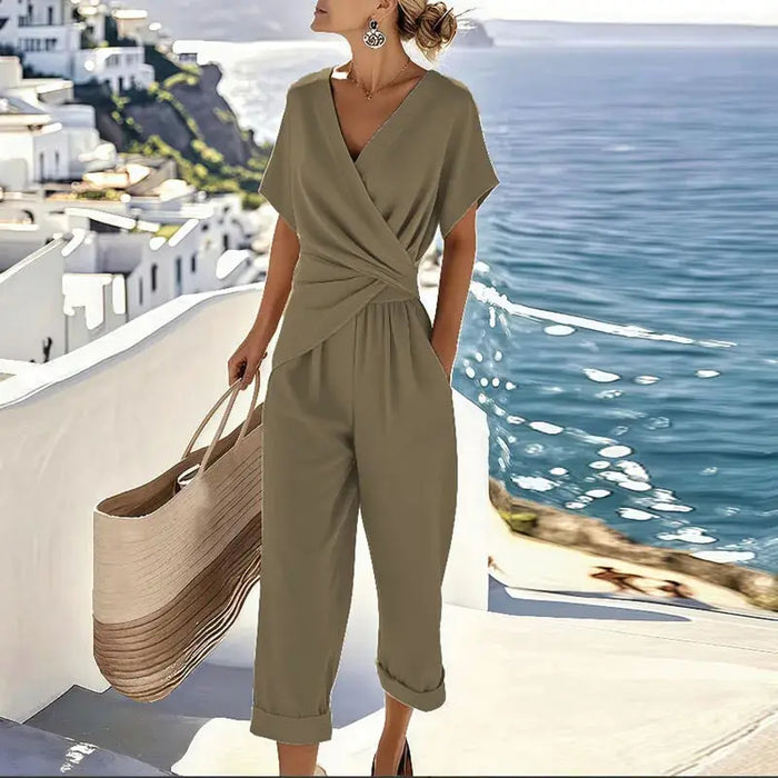 Women's lightweight fabric two-piece set featuring an elegant wrap-front top and relaxed trousers, stylish and comfortable for everyday wear.