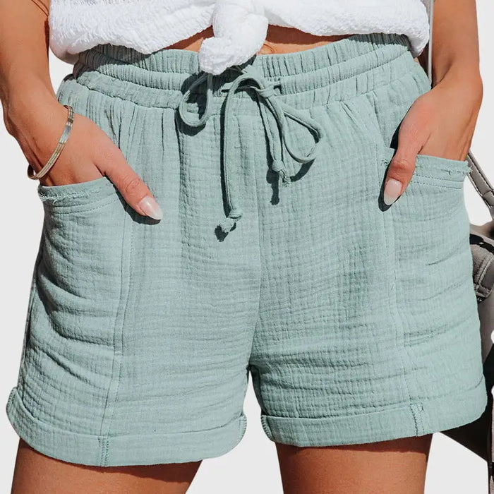 Lightweight women's wide-leg shorts by LondonLaneStore, showing breezy, comfortable summer fabric and relaxed fit style.