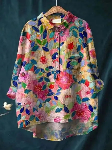 Women’s lightweight floral blouse by LondonLaneStore featuring a relaxed fit and long sleeves, perfect for summer wear.