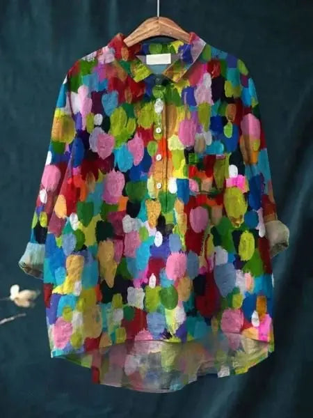 Women’s lightweight floral blouse by LondonLaneStore featuring a relaxed fit, long sleeves, and a summery, feminine design.