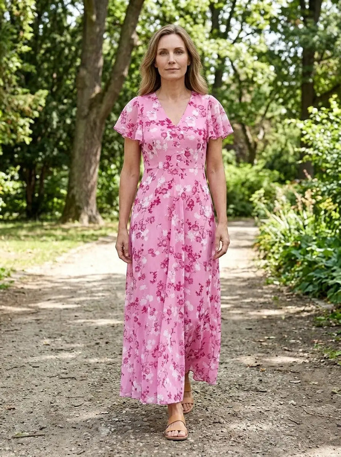 Women's lightweight floral maxi dress by LondonLaneStore featuring an elegant, flowing summer style and vibrant floral pattern.
