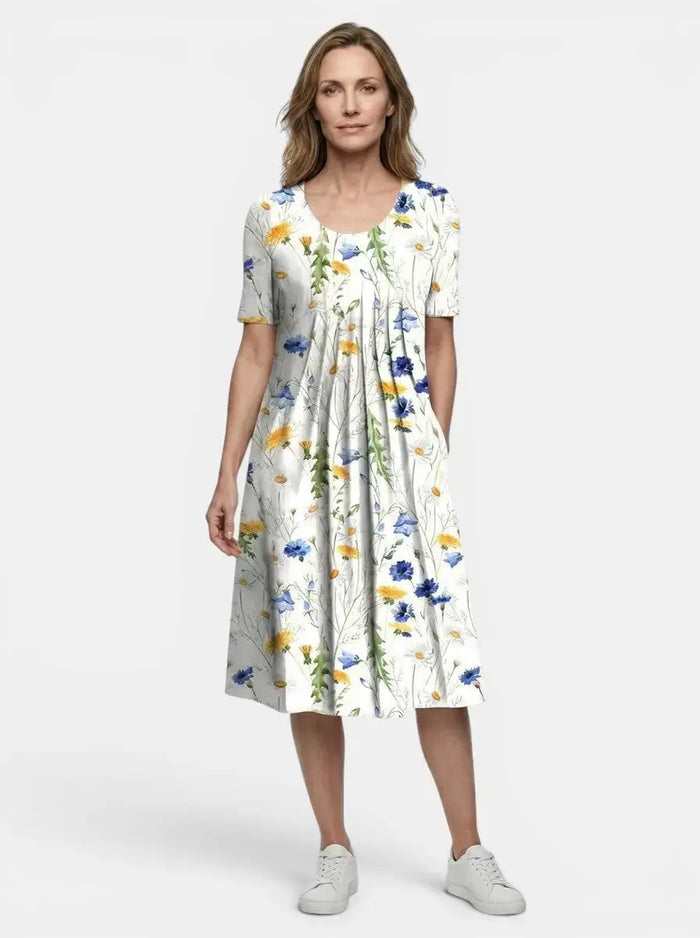 Women's lightweight floral print midi dress by LondonLaneStore, flowing A-line summer dress with a feminine floral pattern.