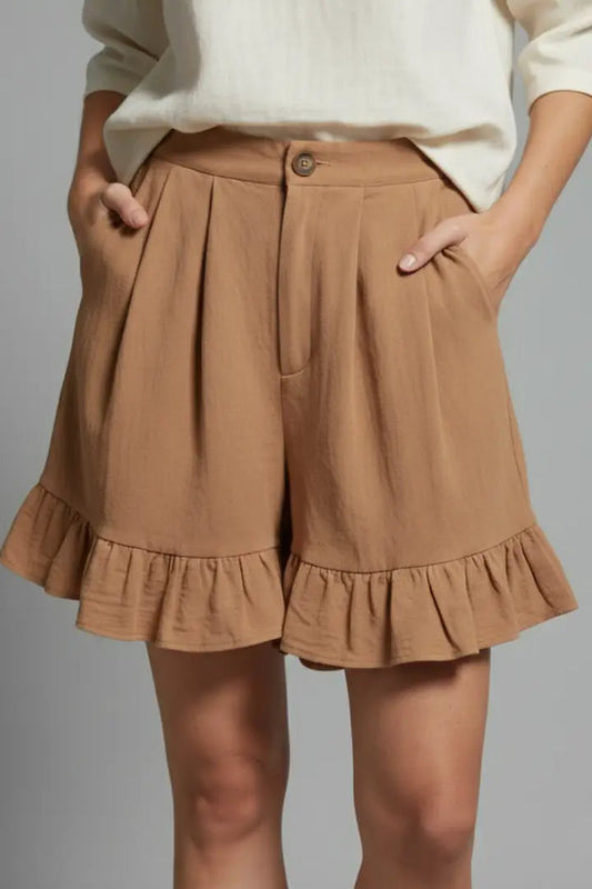 Women's lightweight ruffle hem shorts in high-waist style, featuring playful design and summer-ready cut, from LondonLaneStore.