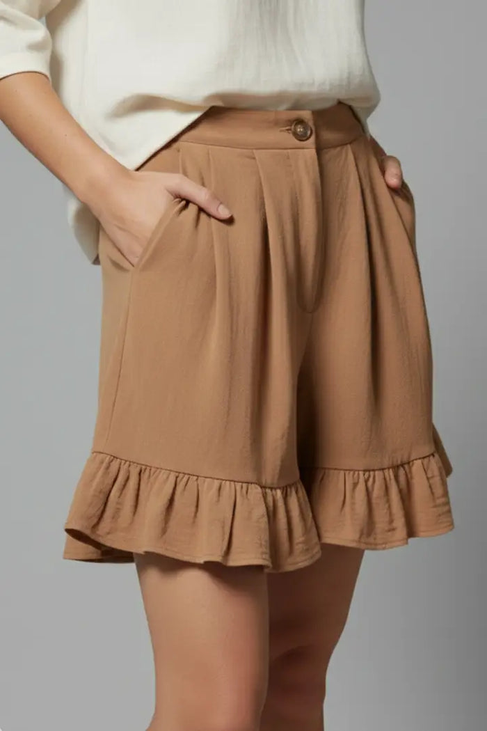 Women's lightweight ruffle hem shorts with high waist, stylish summer bottoms by LondonLaneStore, featuring playful design and breezy fit.