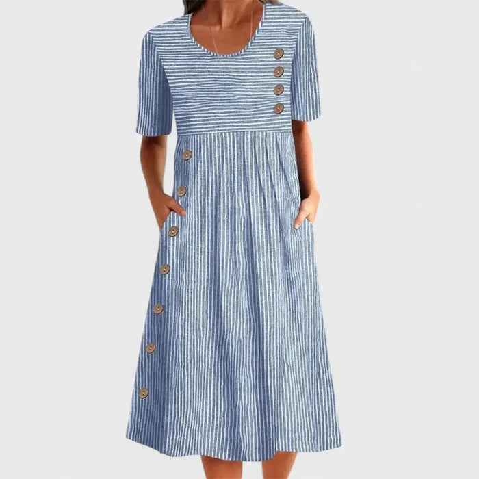 Woman wearing a lightweight striped midi dress by LondonLaneStore, showcasing a stylish and comfortable summer dress look.