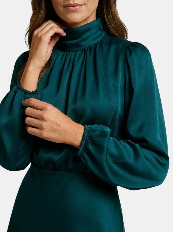 Women's lustrous midi dress with high neck and flared design, perfect for elegant cocktail occasions.