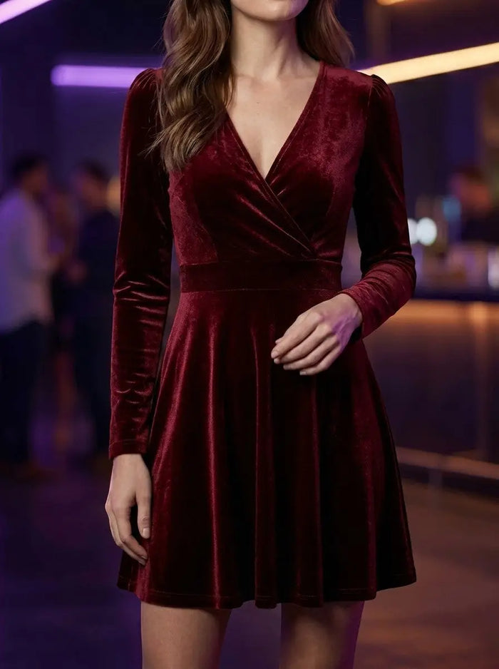 Elegant red velvet flare dress for women, featuring a fitted bodice and flowing skirt, perfect for formal occasions.