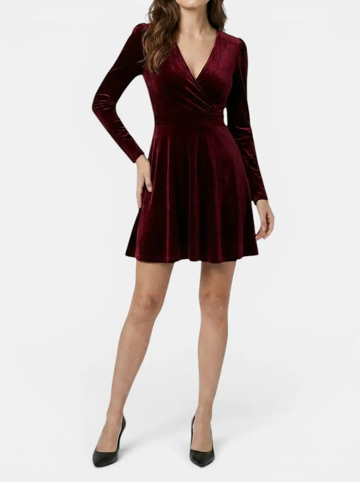Elegant red velvet flare dress for women, featuring a luxurious design suitable for formal evening occasions.