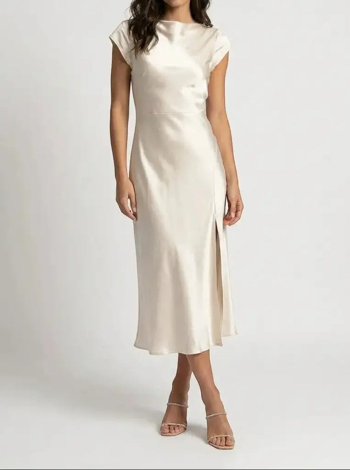 Elegant women’s minimalist midi slip dress by LondonLaneStore, flowing summer dress suitable for cocktail events.