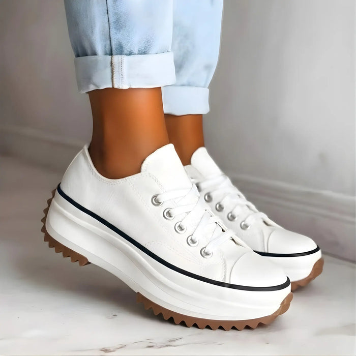 Women’s orthopedic fabric sneakers with chunky lace-up design, supportive walking shoes for comfort and style.