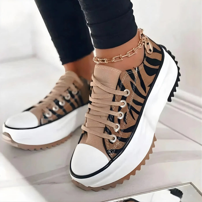 Women's orthopedic fabric sneakers with chunky laces and supportive design, perfect for comfortable walking.