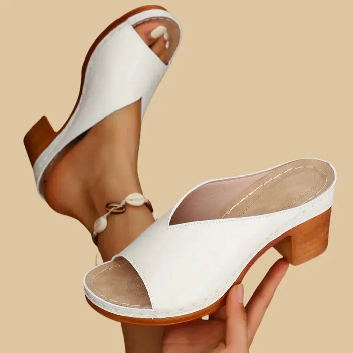 Women's orthopedic leather sandals with supportive thick heels, designed for comfort and stylish support by LondonLaneStore.